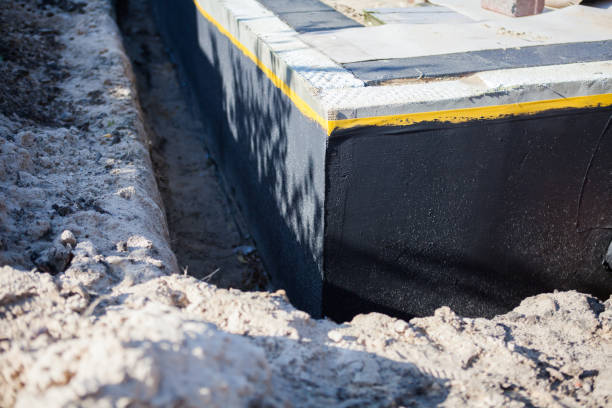 Professional Emergency Waterproofing technician working in Litchfield, MN